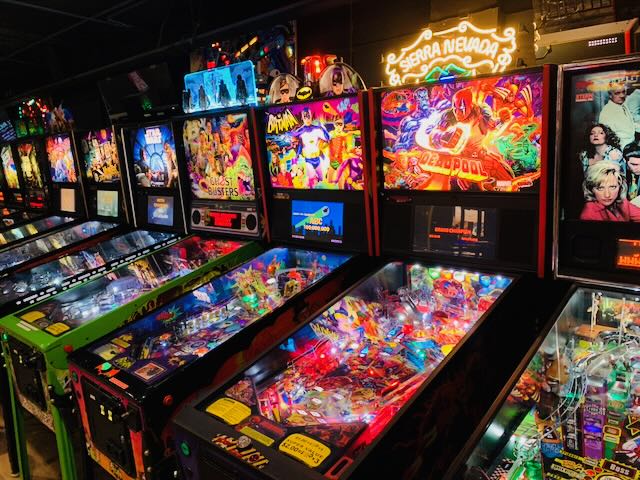 A long row of machines lit up and waiting for play to start